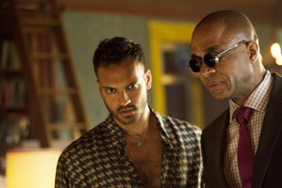 THE MAGICIANS -- "The World in the Walls" Episode 104 -- Pictured: (l-r) Arjun Gupta as Penny, Rick Worthy as Dean -- (Photo by: Carole Segal/Syfy)