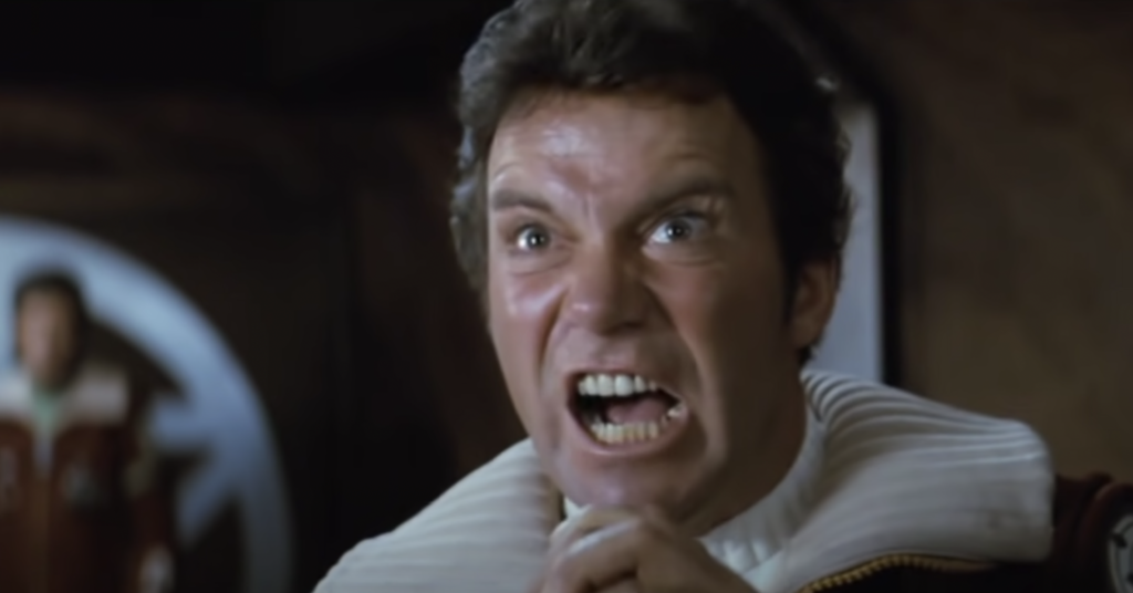 One of the most famous movie screams: William Shatner's Captain Kirk in Star Trek II: The Wrath of Khan. Kirk is viewed here from the shoulders up and has his mouth wide open in anger.